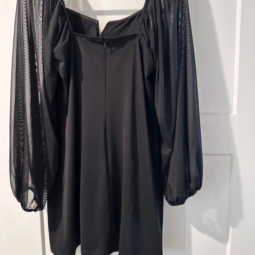 Little black dress. Form fitting. Size large.